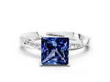 White gold Princess Cut Blue Sapphire Engagement Ring with Side Stone Accents and Four-Prong Setting_39