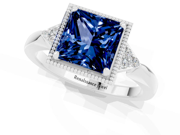 Platinum Princess Cut Blue Sapphire Halo Ring with Tapered Band and Four-Prong Setting