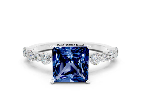 White gold Princess Cut Blue Sapphire Prong Set Engagement Ring with Pavé Band