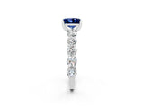 White gold Princess Cut Blue Sapphire Prong Setting with Side Stones on a Pave Band_2