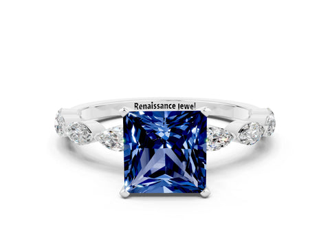 White gold Princess Cut Blue Sapphire Ring with Marquise Side Stones and Prong Setting