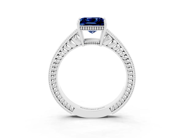 White gold Princess Cut Blue Sapphire Ring with Milgrain Pavé Band and Four-Prong Setting