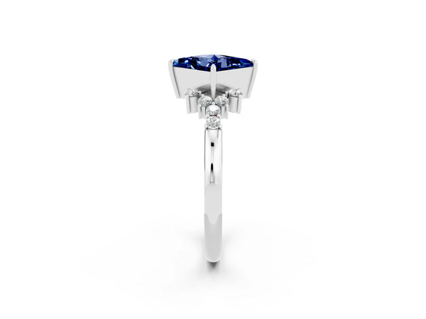 Silver Princess Cut Blue Sapphire Ring with Side Stones and Four-Prong Setting