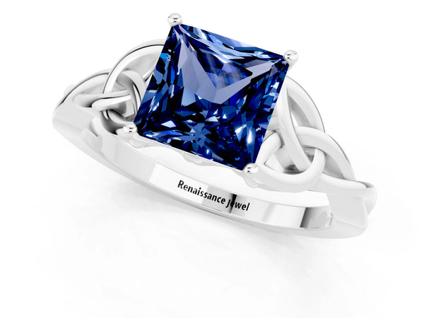 Platinum Princess Cut Blue Sapphire Solitaire Engagement Ring with Celtic Knot Band and Four-Prong Setting