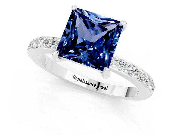 White gold Princess Cut Blue Sapphire Solitaire Engagement Ring with Pavé Band and Four-Prong Setting