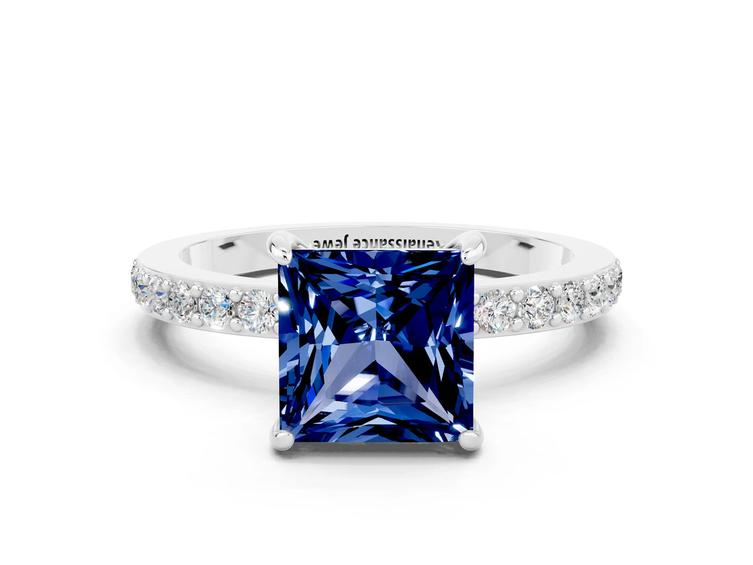 White gold Princess Cut Blue Sapphire Solitaire Engagement Ring with Pavé Band and Four-Prong Setting