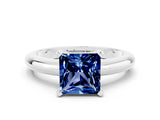 White gold Princess Cut Blue Sapphire Solitaire Engagement Ring with Round Band and Four-Prong Setting