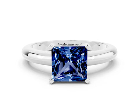 White gold Princess Cut Blue Sapphire Solitaire Engagement Ring with Round Band and Four-Prong Setting