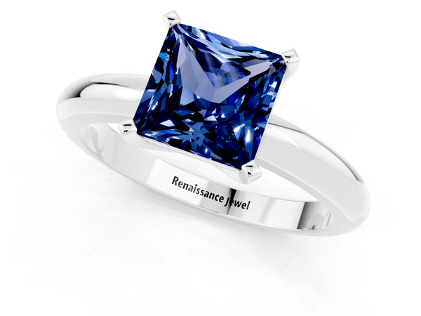 Silver Princess Cut Blue Sapphire Solitaire Engagement Ring with Round Band and Four-Prong Setting
