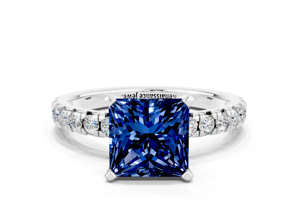 Platinum Princess Cut Blue Sapphire Solitaire Pavé Engagement Ring with Round Band and Prong Setting