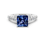 White gold Princess Cut Blue Sapphire Solitaire Ring with Cathedral Setting and Pavé Band