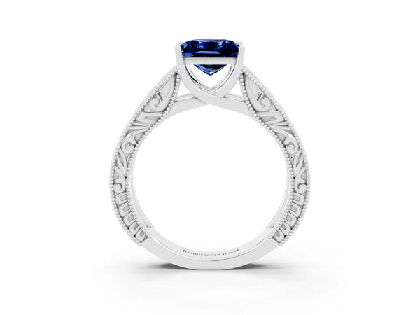 Platinum Princess Cut Blue Sapphire Solitaire Ring with Engraved Band and Four-Prong Setting