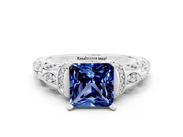 White gold Princess Cut Blue Sapphire Solitaire Ring with Filigree Band and Four-Prong Setting