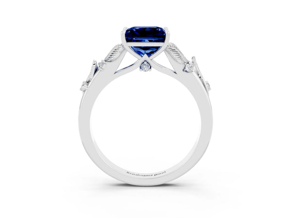 Silver Princess Cut Blue Sapphire Solitaire Ring with Leaf Motif Band and Four-Prong Setting
