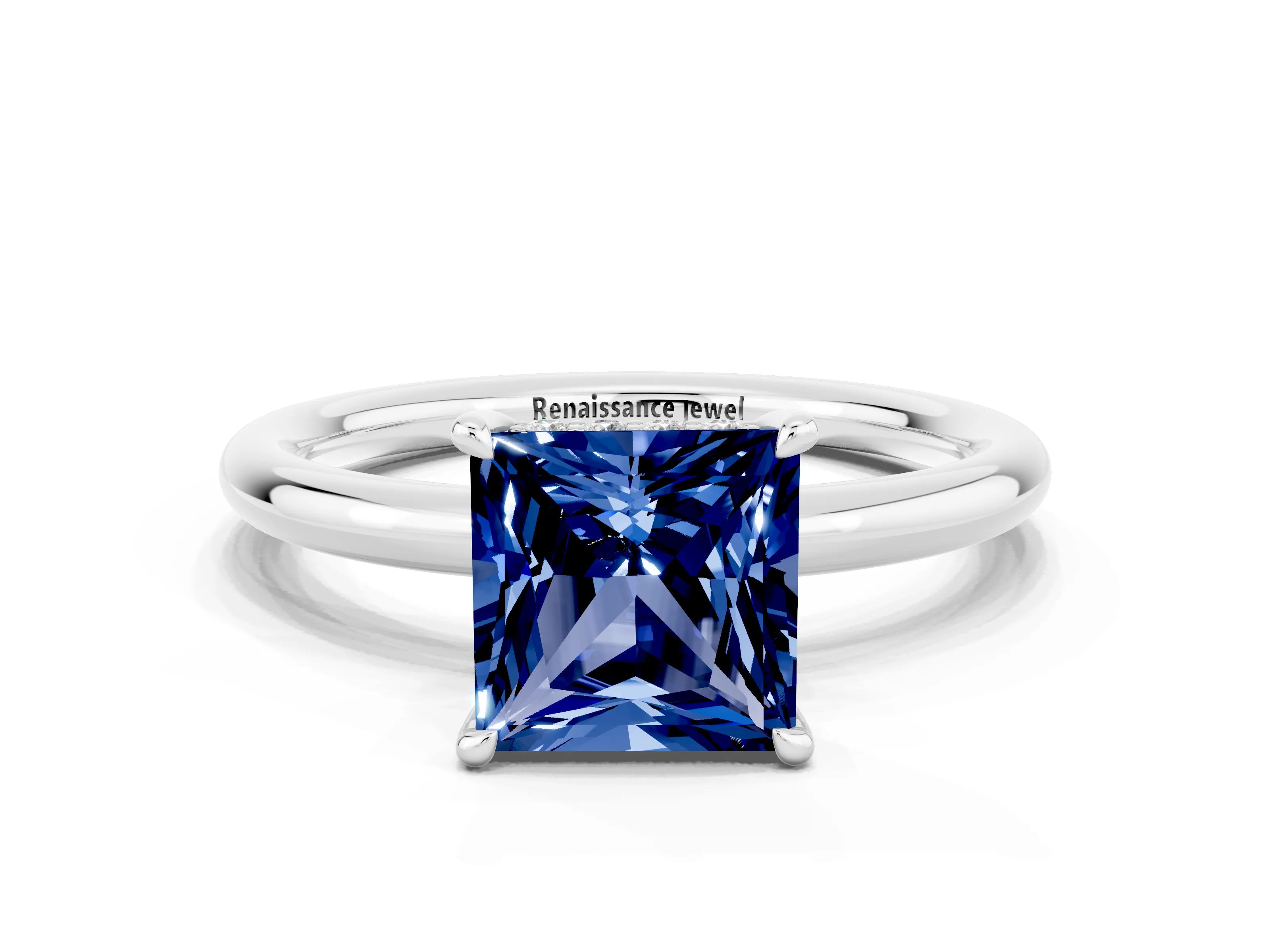 White gold Princess Cut Blue Sapphire Solitaire Ring with Thin Band and Four-Prong Setting