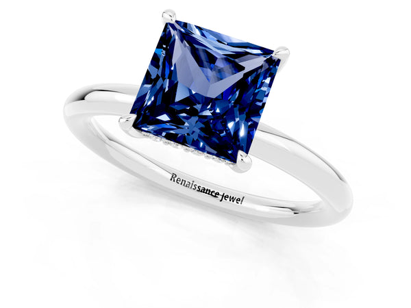 White gold Princess Cut Blue Sapphire Solitaire Ring with Thin Band and Four-Prong Setting