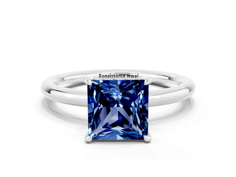 White gold Princess Cut Blue Sapphire Solitaire Ring with Thin Band and Four-Prong Setting