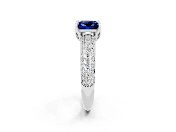 Silver Princess Cut Blue Sapphire Solitaire Ring with Three-Row Pavé Band and Four-Prong Setting