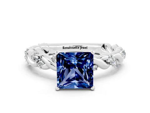 White gold Princess Cut Blue Sapphire Solitaire Ring with Twisted Band and Pavé Accents