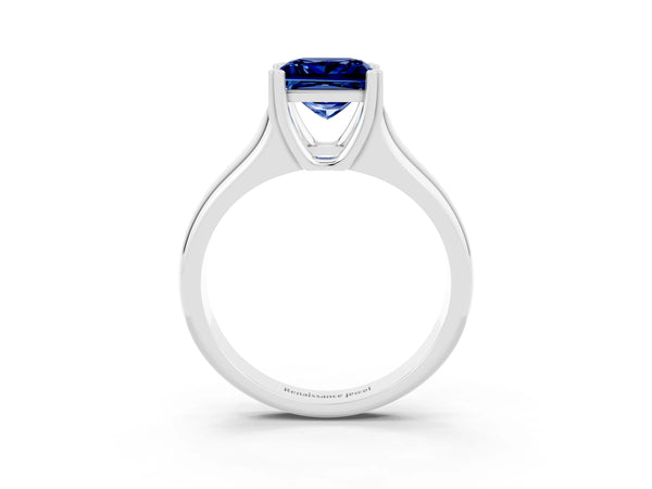 Platinum Princess Cut Blue Sapphire Solitaire Ring with Wide Band and Prong Setting
