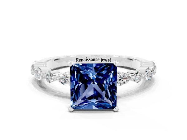 Platinum Princess Cut Blue Sapphire Ring with Marquise and Round  Side Stones and Four-Prong Setting