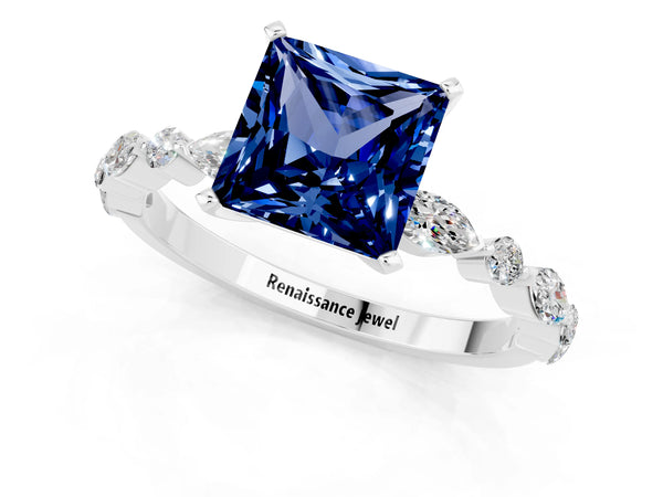 White gold Princess Cut Blue Sapphire Ring with Marquise and Round  Side Stones and Four-Prong Setting