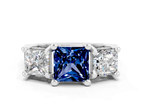 White gold Princess Cut Blue Sapphire Three-Stone Ring with Channel Set Band and Four-Prong Setting