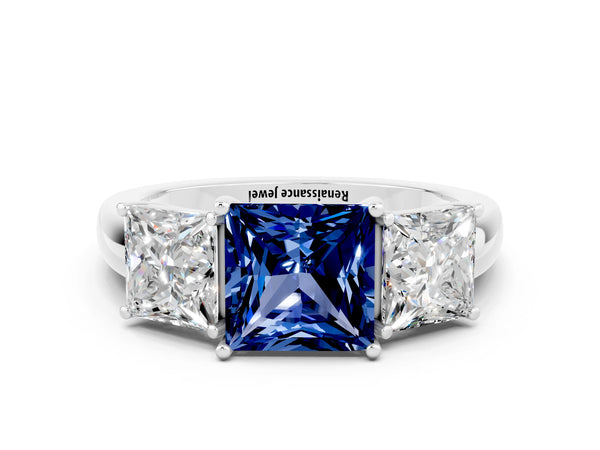 Platinum Princess Cut Blue Sapphire Three-Stone Ring with Four-Prong Setting and Classic Band