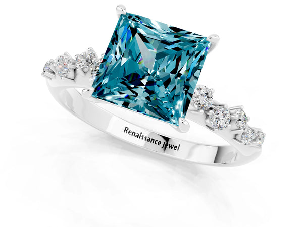 Platinum Princess Cut Blue Topaz Cluster Side Stone Solitaire Ring with Prong Setting