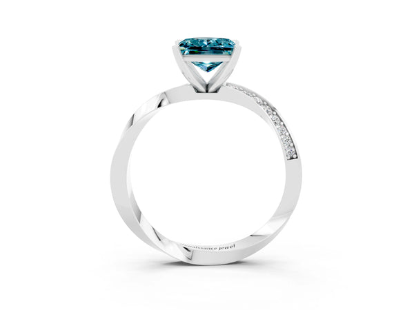 Silver Princess Cut Blue Topaz Engagement Ring with Side Stone Accents and Four-Prong Setting