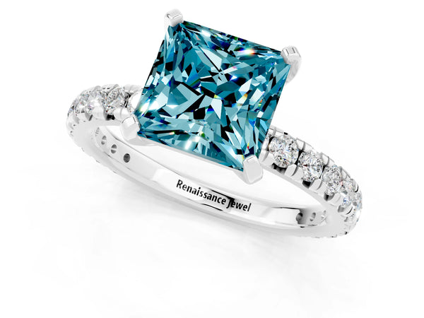 Platinum Princess Cut Blue Topaz Pavé Solitaire Ring with Round Band and Prong Setting