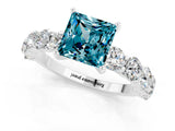 White gold Princess Cut Blue Topaz Prong Setting with Side Stones on a Pave Band_1