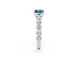 White gold Princess Cut Blue Topaz Prong Setting with Side Stones on a Pave Band_2