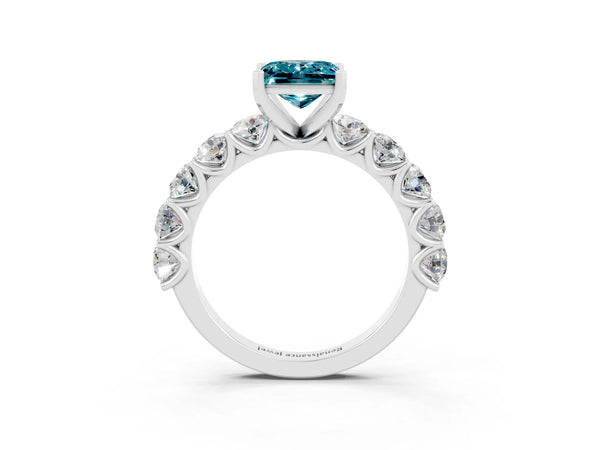 Silver Princess Cut Blue Topaz Prong Setting with Side Stones on a Pave Band