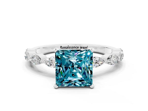 White gold Princess Cut Blue Topaz Ring with Marquise Side Stones and Prong Setting