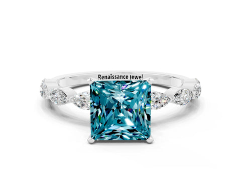 White gold Princess Cut Blue Topaz Ring with Marquise Side Stones and Prong Setting