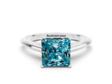 White gold Princess Cut Blue Topaz Solitaire Engagement Ring with Cathedral Setting and Four-Prong Mount_24