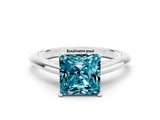 White gold Princess Cut Blue Topaz Solitaire Engagement Ring with Cathedral Setting and Four-Prong Mount_30