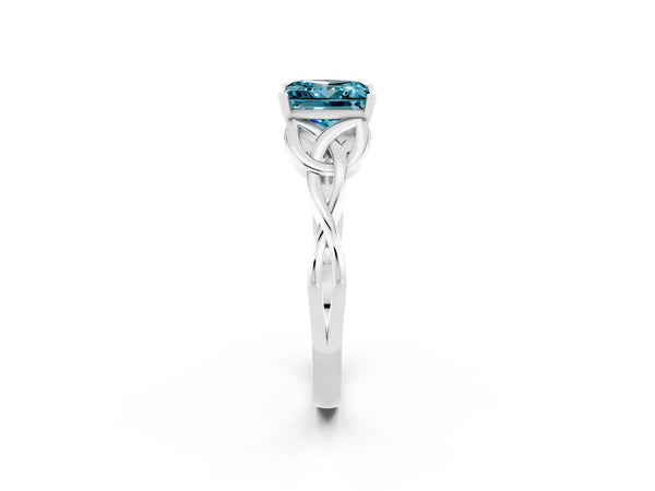 Silver Princess Cut Blue Topaz Solitaire Engagement Ring with Celtic Knot Band and Four-Prong Setting