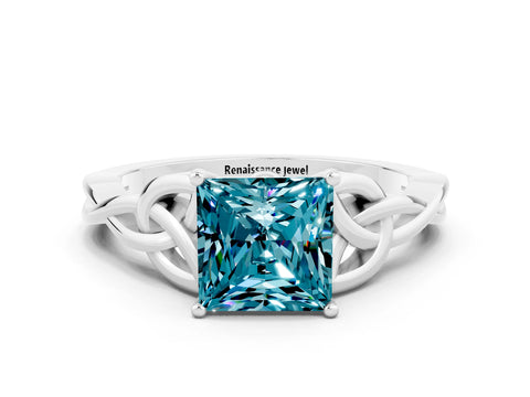 White gold Princess Cut Blue Topaz Solitaire Engagement Ring with Celtic Knot Band and Four-Prong Setting