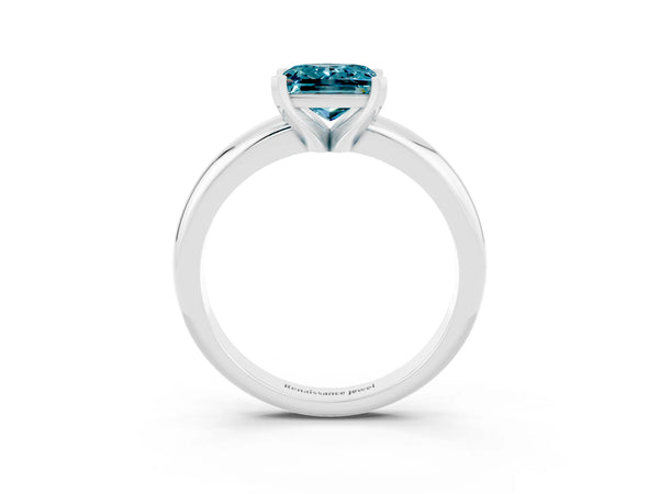 Silver Princess Cut Blue Topaz Solitaire Engagement Ring with Round Band and Four-Prong Setting