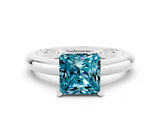 White gold Princess Cut Blue Topaz Solitaire Engagement Ring with Round Band and Four-Prong Setting