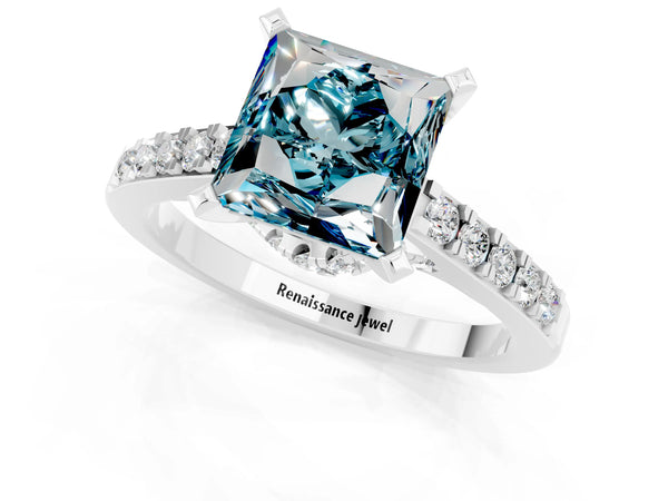 Platinum Princess Cut Blue Topaz Solitaire Ring with Crossover Gallery and Round  Pavé Band