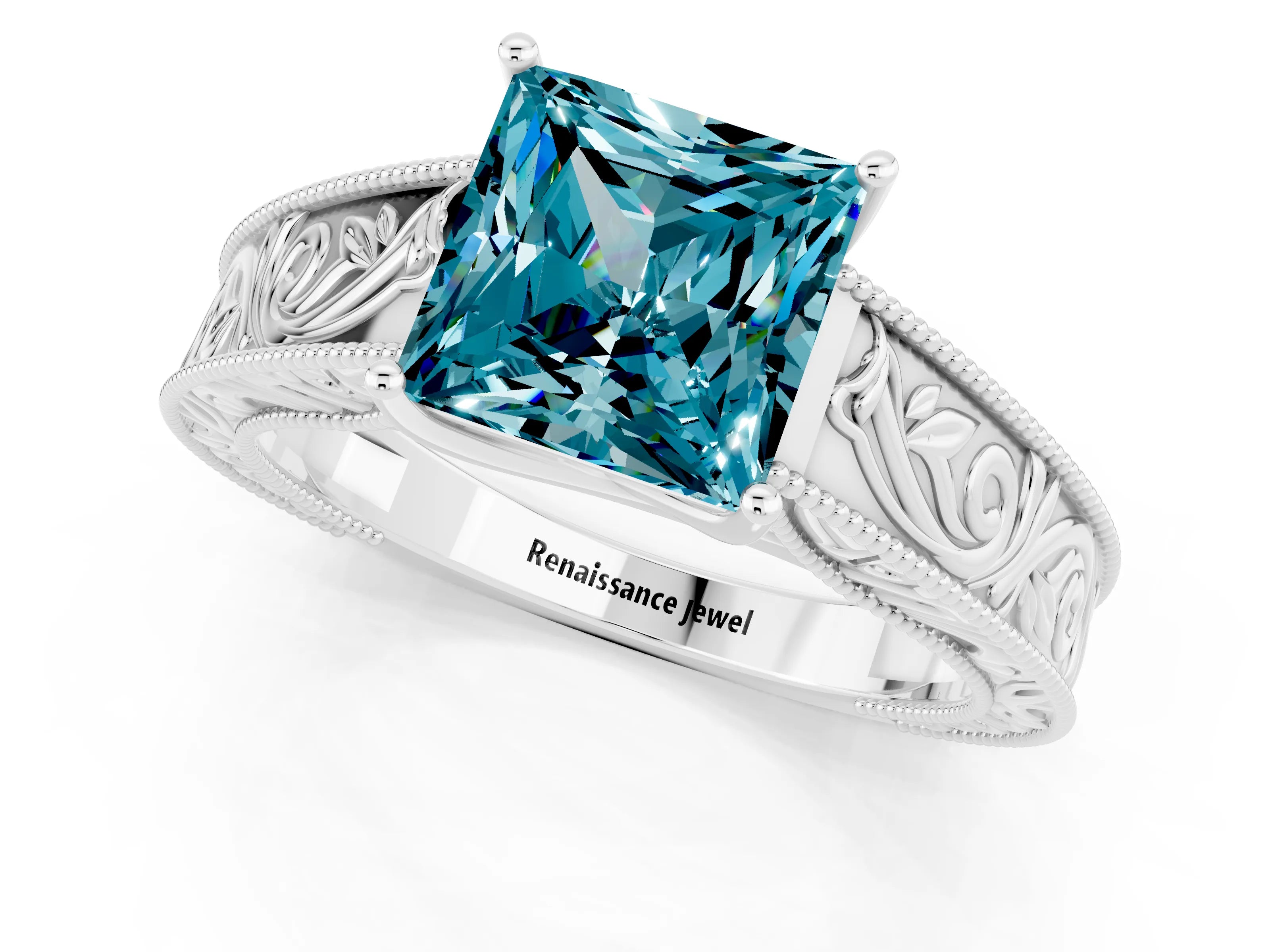 White gold Princess Cut Blue Topaz Solitaire Ring with Engraved Band and Four-Prong Setting_1