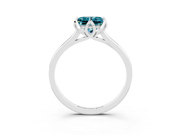Platinum Princess Cut Blue Topaz Solitaire Ring with Flower Prong Setting and Classic Band
