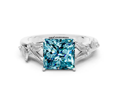 White gold Princess Cut Blue Topaz Solitaire Ring with Leaf Motif Band and Four-Prong Setting
