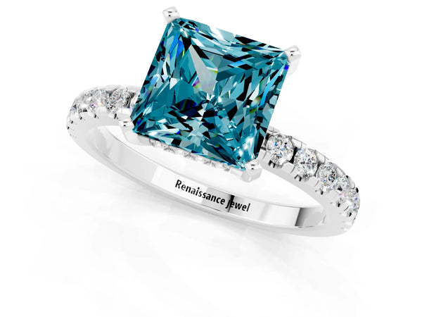 Silver Princess Cut Blue Topaz Solitaire Ring with Round  Pavé Band and Four-Prong Setting