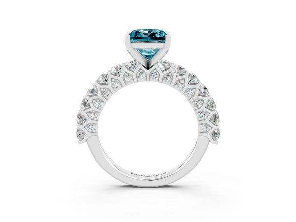 Silver Princess Cut Blue Topaz Solitaire Ring with Shared Prong Pavé Band and Four-Prong Setting