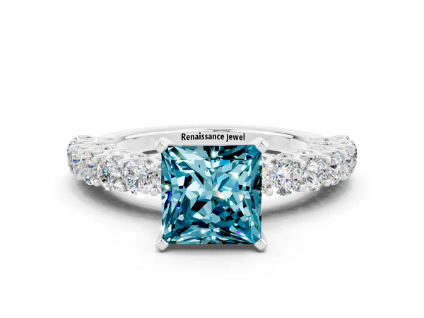 White gold Princess Cut Blue Topaz Solitaire Ring with Shared Prong Pavé Band and Four-Prong Setting