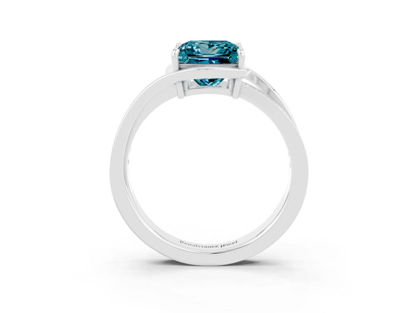 Platinum Princess Cut Blue Topaz Solitaire Ring with Split Shank and Prong Setting